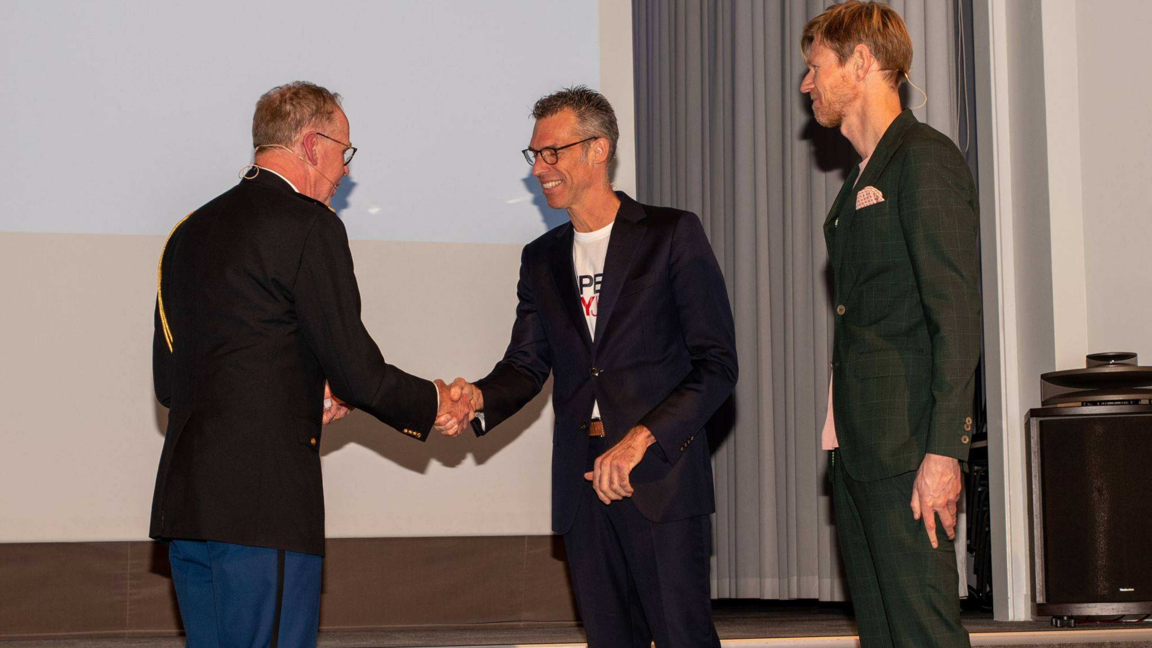 Een foto van de lectorale rede van Bauke Koekkoek bij de Politieacademie. 