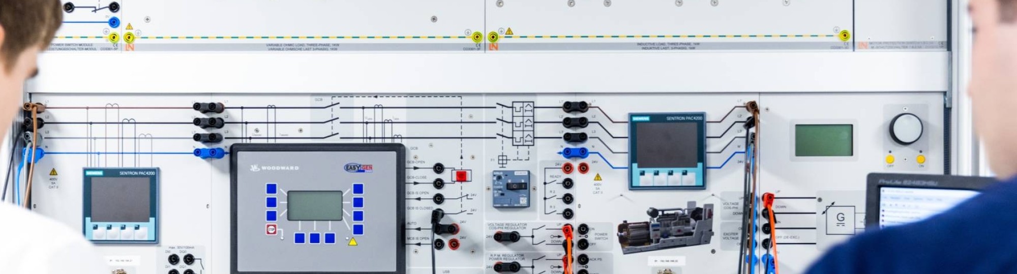 two engineering students working in the lab