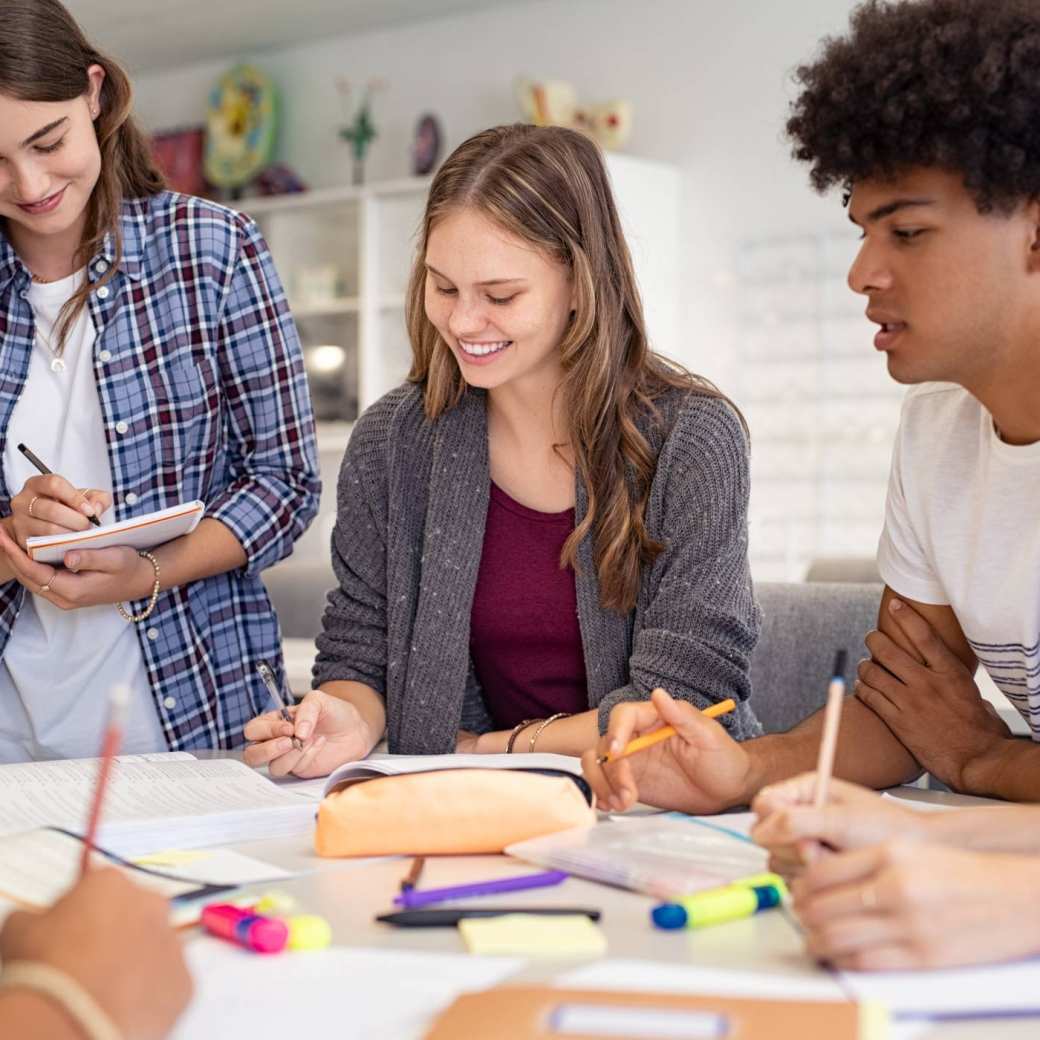 Exchange students are sitting in a classroom