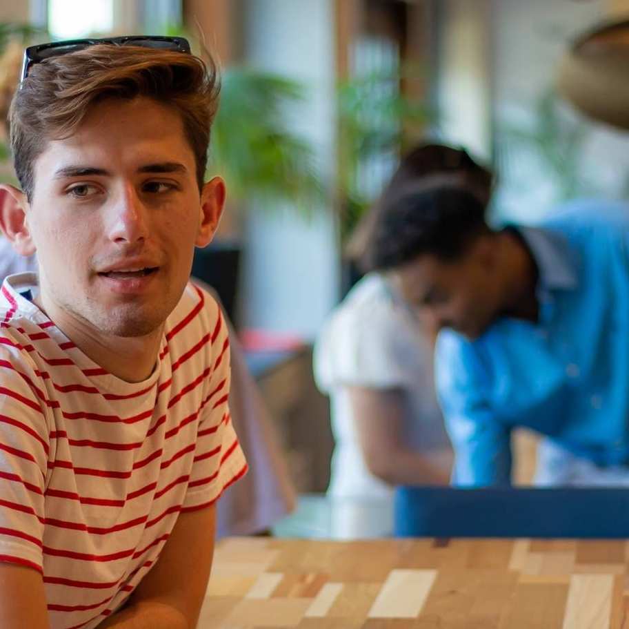 Students talking at table