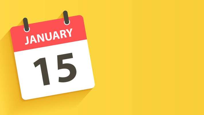 Een kalender die 15 januari als datum aangeeft tegen een gele achtergrond. 