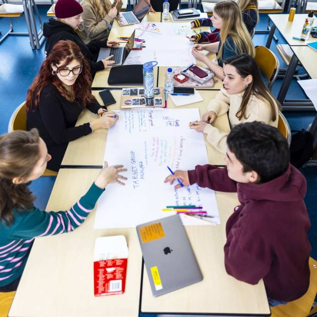 International Social Work students work together on a project.